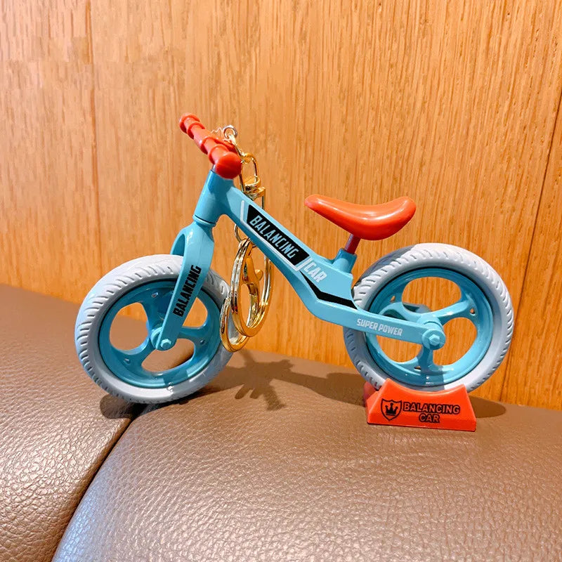 Cartoon Bicycle Lovers Keychain | Actionable Sliding Feature | Fun Play Hanging Ornaments | Small Gift Idea ShopOnlyDeal