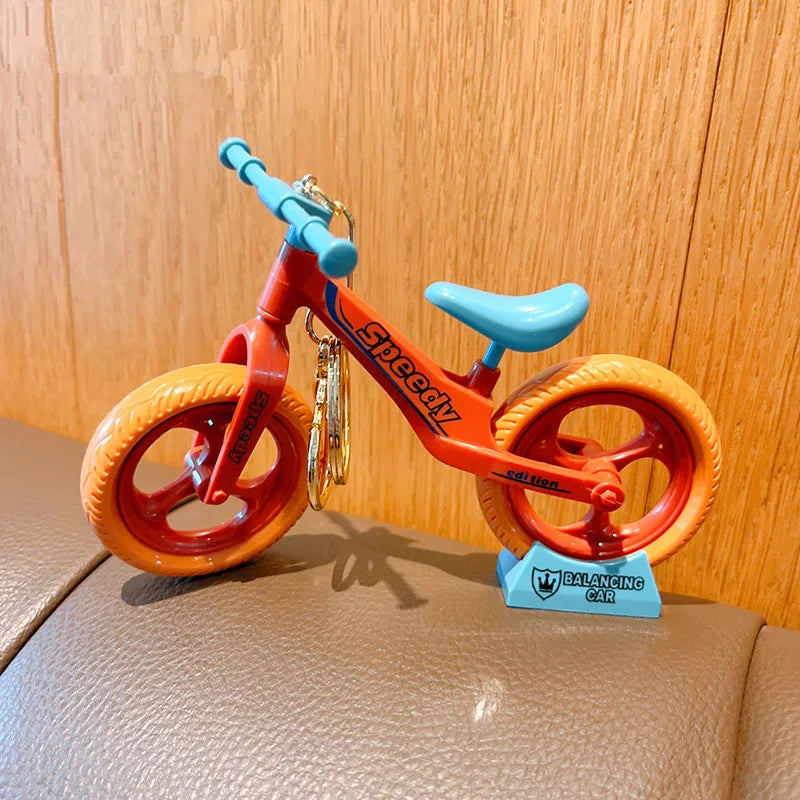 Cartoon Bicycle Lovers Keychain | Actionable Sliding Feature | Fun Play Hanging Ornaments | Small Gift Idea ShopOnlyDeal