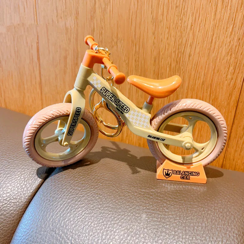 Cartoon Bicycle Lovers Keychain | Actionable Sliding Feature | Fun Play Hanging Ornaments | Small Gift Idea ShopOnlyDeal